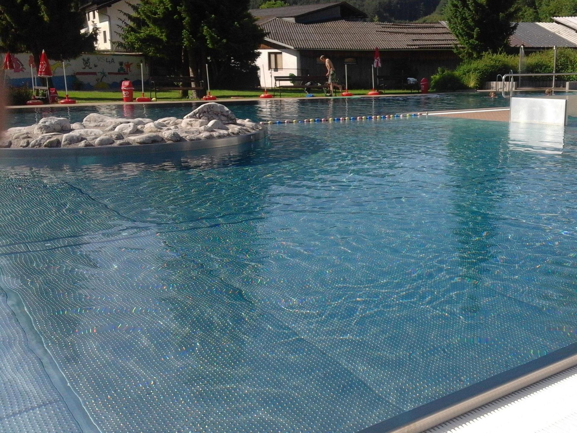 Outdoor pool Grünau im Almtal — swimming area with mountain views